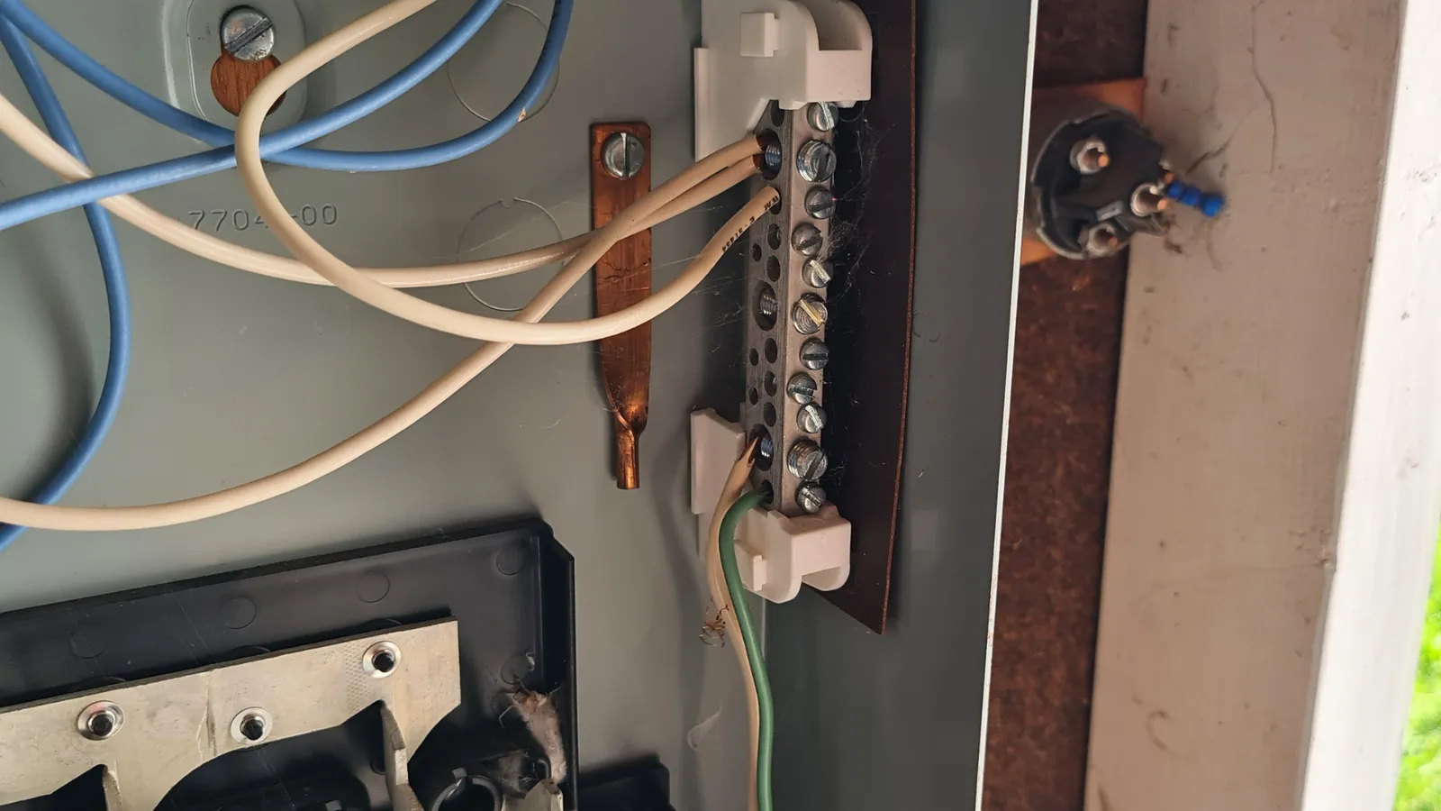Close-up of wiring inside an open electrical panel