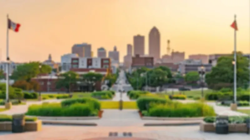 Downtown Des Moines skyline rising behind landscaped gardens