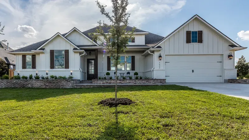 Bright white farmhouse-style new build home